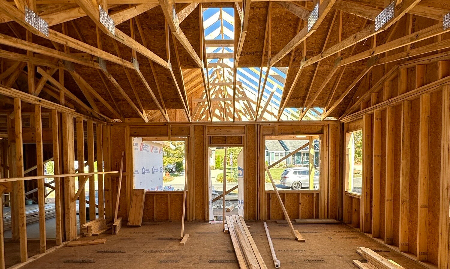 A home that is in the construction process with wood framing.